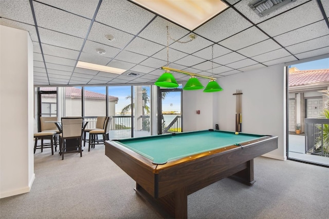 rec room with a drop ceiling, pool table, and carpet