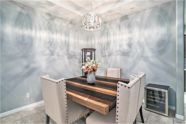 tiled dining space featuring heating unit and a notable chandelier