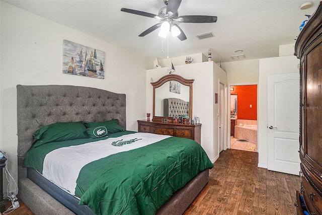 bedroom featuring dark hardwood / wood-style flooring and ceiling fan