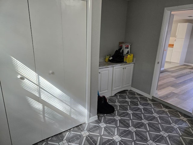 hallway featuring hardwood / wood-style floors