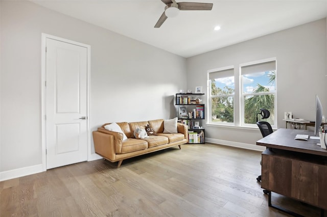 office featuring light hardwood / wood-style flooring and ceiling fan