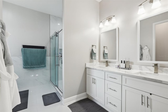 bathroom with vanity, tile patterned floors, and an enclosed shower