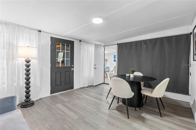 dining room with light hardwood / wood-style floors