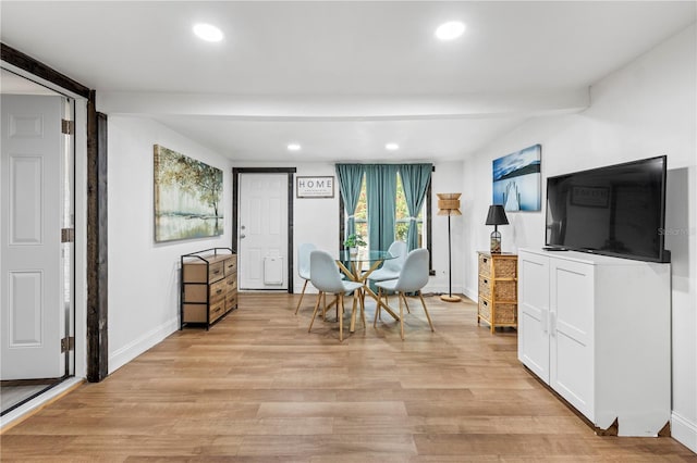 dining space featuring light hardwood / wood-style flooring