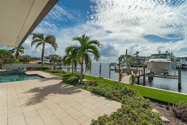 exterior space with a water view and a boat dock