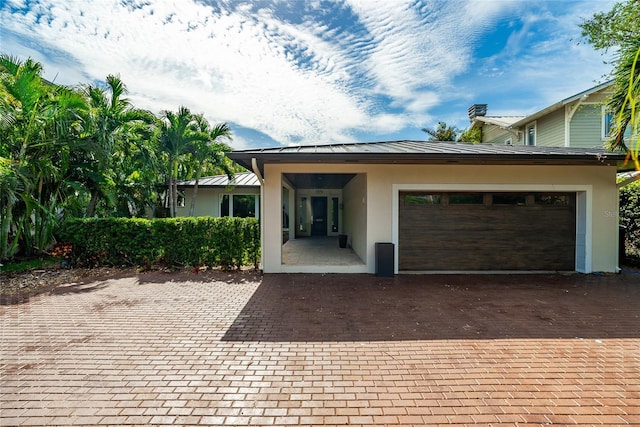 view of front of home featuring a garage