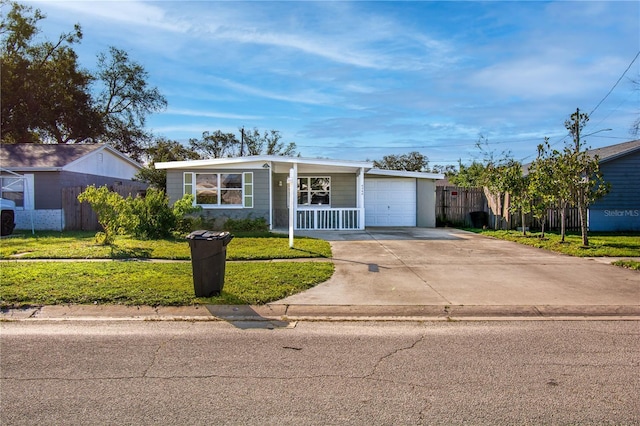 ranch-style house with a front lawn and a garage