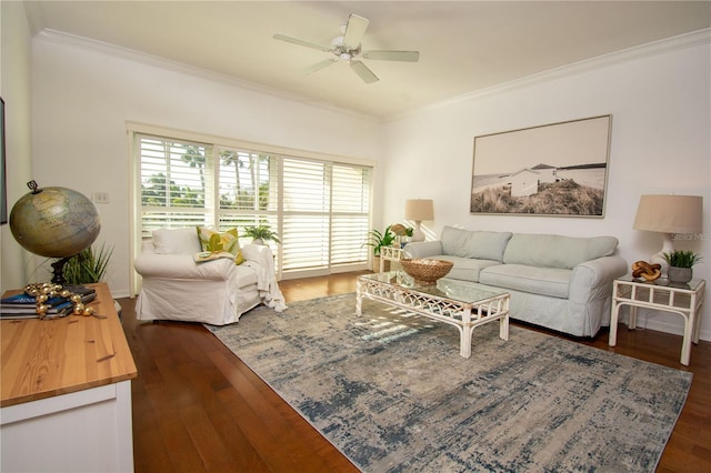 living room with ceiling fan, dark hardwood / wood-style flooring, and crown molding