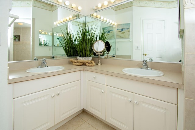 bathroom featuring tile patterned floors and vanity