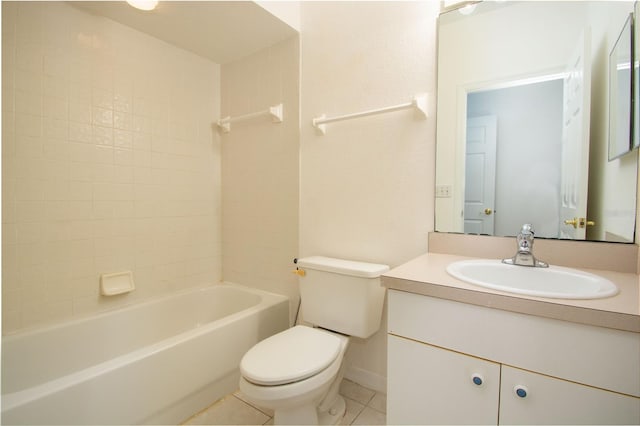 full bathroom featuring tile patterned flooring, vanity, toilet, and tiled shower / bath combo