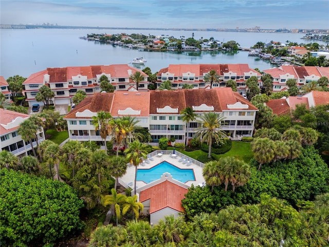 drone / aerial view with a water view