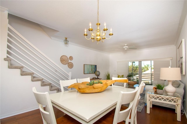 dining room featuring crown molding, dark wood-type flooring, and ceiling fan with notable chandelier