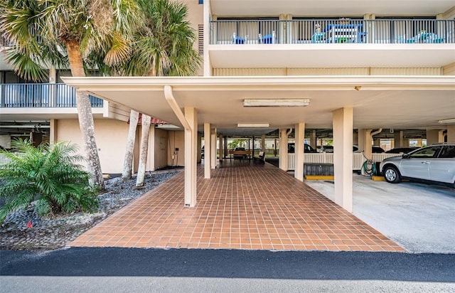 exterior space featuring a carport