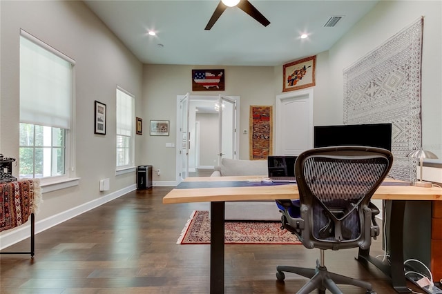 home office featuring ceiling fan and dark wood-type flooring