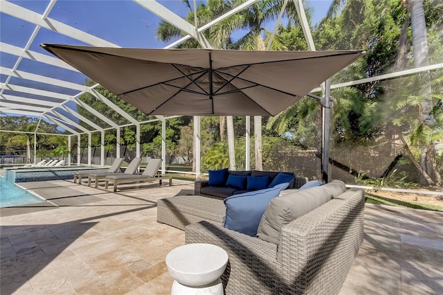 view of patio / terrace with outdoor lounge area and glass enclosure