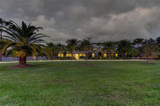 view of home's community with a lawn