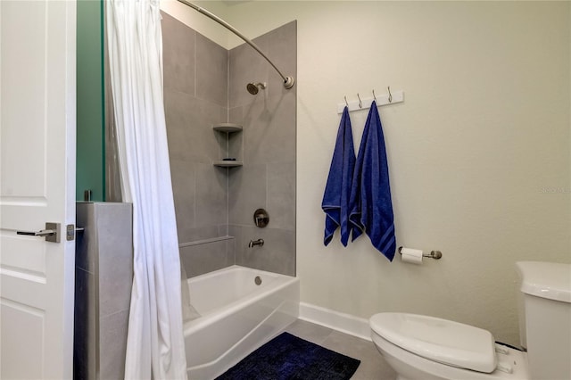 bathroom featuring toilet, shower / bath combo, and tile patterned floors