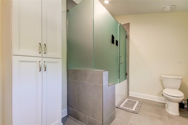 bathroom featuring tile patterned floors, toilet, and plus walk in shower