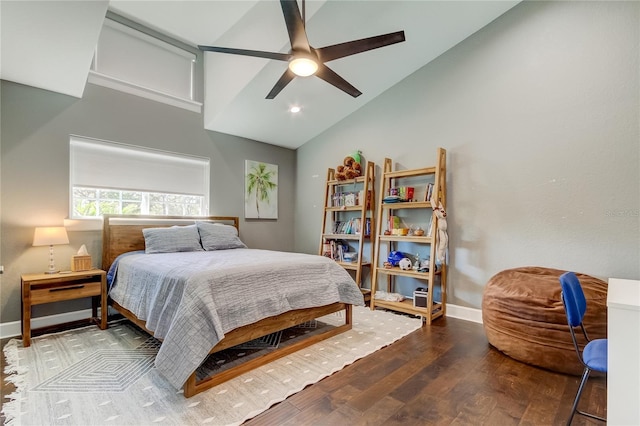 bedroom featuring hardwood / wood-style floors, ceiling fan, and high vaulted ceiling