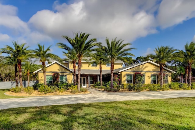 view of front of home with a front yard