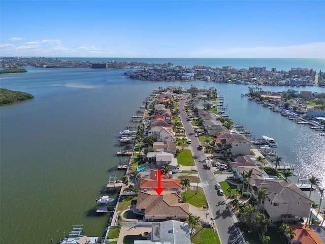 birds eye view of property featuring a water view