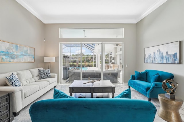 carpeted living room featuring ornamental molding