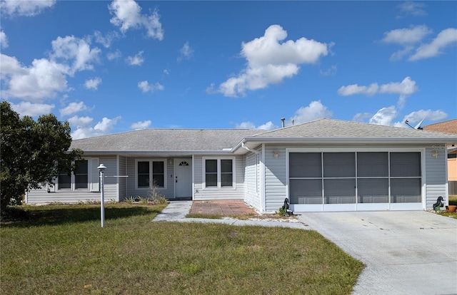 single story home with a garage and a front yard