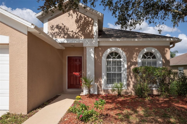 entrance to property with a garage