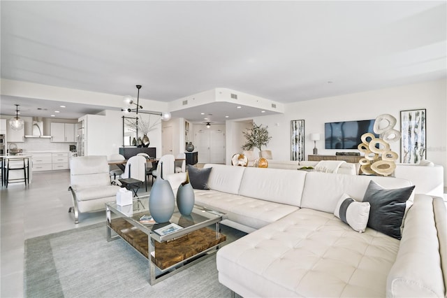 living room featuring an inviting chandelier