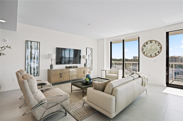 living room with light tile patterned flooring and a wealth of natural light