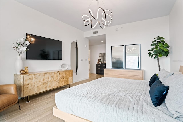 bedroom featuring wood-type flooring