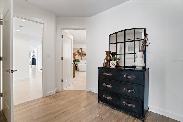 hallway featuring light hardwood / wood-style floors