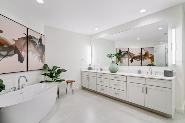 bathroom with vanity, separate shower and tub, and tile patterned floors