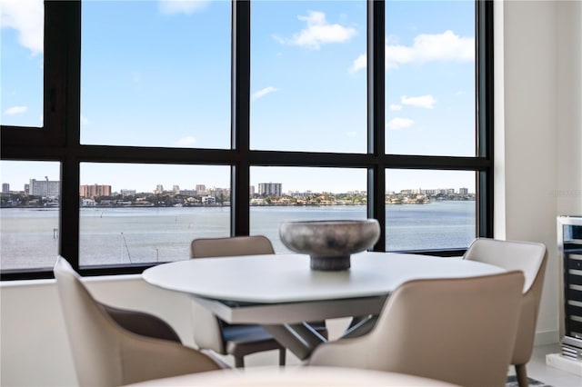 dining room with a water view