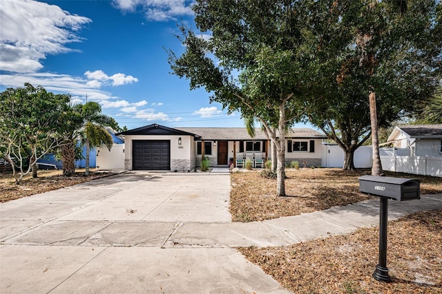 ranch-style home with a garage