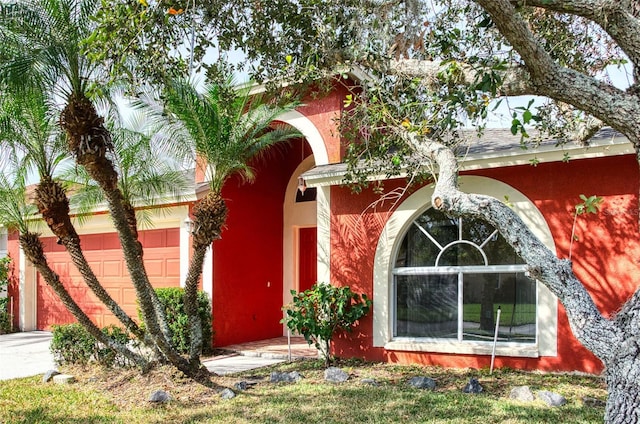 property entrance with a garage