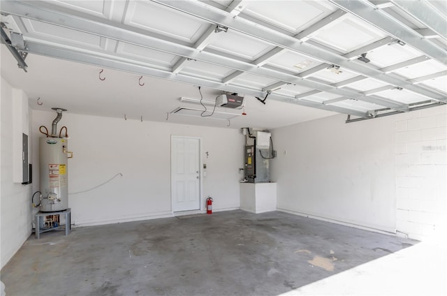 garage with a garage door opener and gas water heater