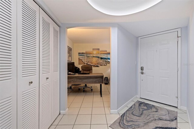 5281 Isla Key Blvd S Unit 206, Saint Petersburg, FL 33715 - entrance foyer featuring light tile patterned flooring and baseboards