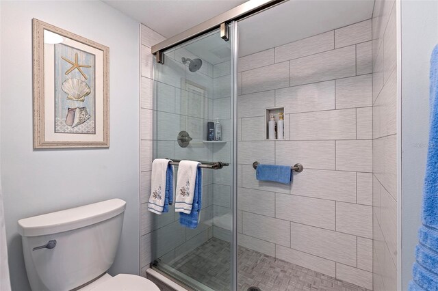 5281 Isla Key Blvd S Unit 206, Saint Petersburg, FL 33715 - bathroom featuring toilet and a stall shower