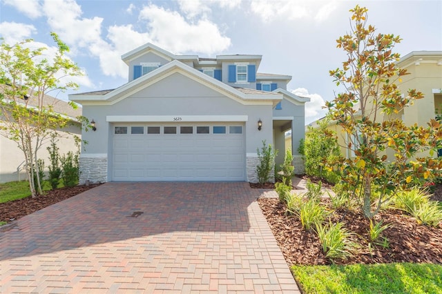 view of front of home with a garage