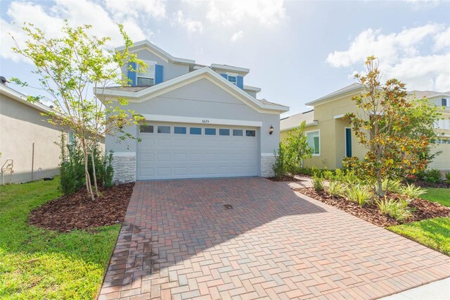 front facade with a garage