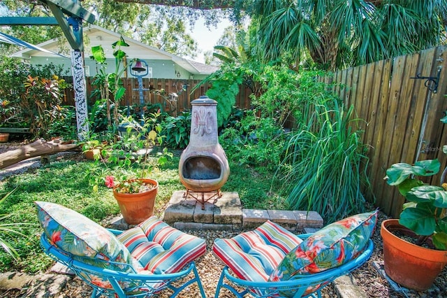 view of patio / terrace with an outdoor fire pit