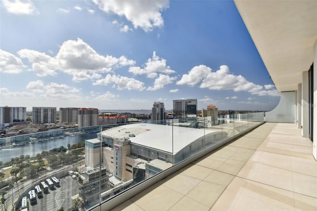 balcony featuring a water view