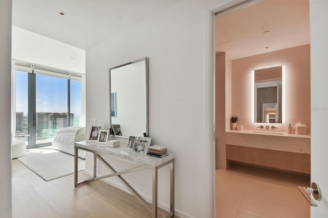 interior space featuring hardwood / wood-style flooring and vanity