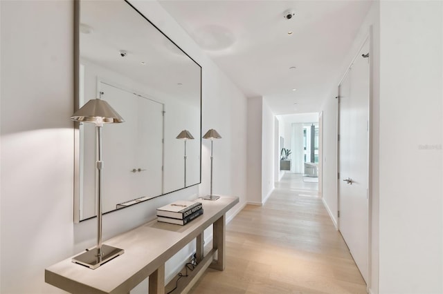 1000 Water St Unit 1702, Tampa, FL 33602 - hall with light wood-type flooring