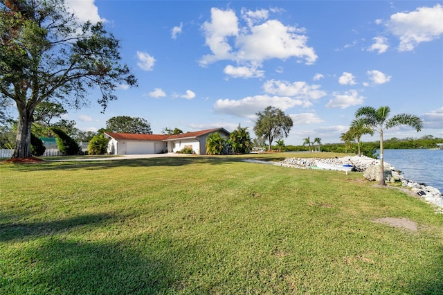 view of yard with a water view