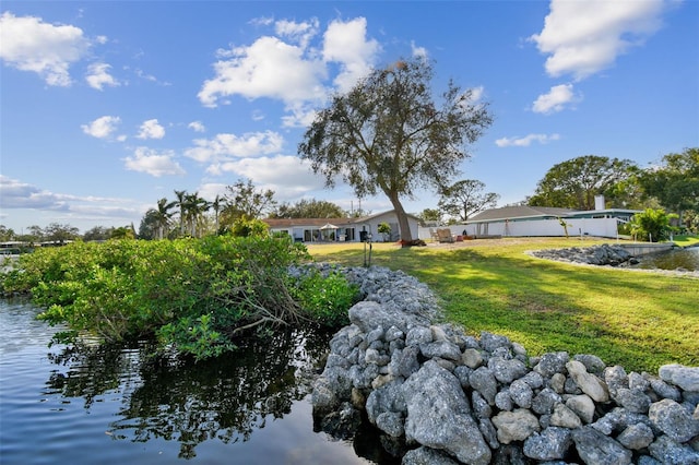 view of yard featuring a water view