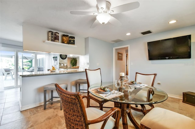 dining area featuring ceiling fan