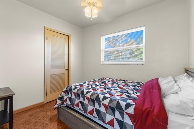 bedroom with parquet flooring