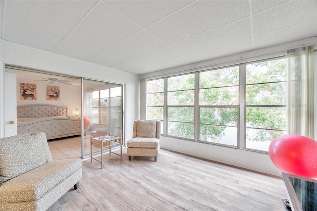 sunroom / solarium with a drop ceiling